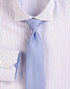 Pink and blue stripes define a clean, classic fit in fine cotton shirting. ButtonfrontRegular fitSpread collarCottonDry cleanImported