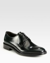 Timeless lace-up oxford rendered in smooth, supple Italian leather.Leather upperLeather liningPadded insoleRubber soleMade in ItalyOUR FIT MODEL RECOMMENDS ordering one half size down as this style runs large. 