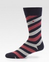 Add a dose of colorful energy to your professional attire with these comfortable, striped cotton-blend socks.Mid-calf height74% cotton/24% polyamide/2% elastaneMachine washImported