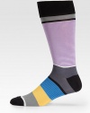 Soft and stretchy in a superior cotton knit with bold stripes allover.Mid-calf height80% cotton/20%nylonMachine washImported