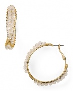 Give your wardrobe a hit of on-trend texture with this pair of twisted hoop earrings from RJ Graziano, accented by rough, wrapped crystals.