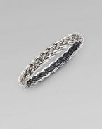 From the Woven Cable Collection. An elegant braid of sterling silver weaves textured and smooth strands into a sophisticated bangle. Sterling silver Diameter, about 2¼ Width, about ¼ Imported