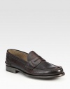 Pebbled calfskin leather in a classic penny loafer design.Leather upperLeather liningWood soleMade in Italy