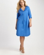 When you think of the quintessential combination of comfort and style, think about this shirtdress. It features a relaxed fit, courtesy of a touch of stretch and a feminine, curved hem.Split neckButton-tab sleevesBust dartsCurved hemAbout 25 from natural hem97% cotton/3% spandexDry cleanMade in USA of imported fabric