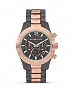 Be a good sport with two-tone watch from MICHAEL Michael Kors, boasting a bold dial and sleek bracelet. Designed for performance and style, it's the ultimate in athletic cool.