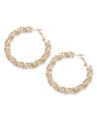 Dazzling by design. Alfani adds a glamorous touch to traditional hoop earrings with a chic, twisted design and sparkling glass accents. Crafted in gold tone mixed metal. Approximate diameter: 1-1/2 inches.