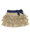 Rendered in lustrous woven cotton voile, a whimsical skirt features three tiers of cascading ruffles and a preppy grosgrain ribbon belt.