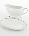 Bright fine china is simply adorned with a band of platinum for an unforgettably elegant table. The Cameo Platinum design from Mikasa's dinnerware and dishes collection is perfect for formal dinners, teas, and luncheons. This gravy boat's delicate, flowing lines add a graceful touch to your table.