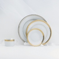 A symphony of elegance that harmonizes beautifully with virtually every decor or color scheme. Gold rim.