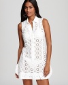 Showcase your feminine side in a playfully pretty Nanette Lepore eyelet dress. A collared neckline and ruffled hem make for a more sophisticated swim coverup.