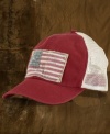 A baseball hat with cotton and mesh panels for breathability gets a vintage feel from a distressed flag patch at the front.