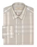 A broad check pattern blending tonal hues distinguishes this handsome dress shirt from Burberry.