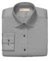 In a soft gray, this Michael Kors dress shirt is a welcome break from your collection of basic white.