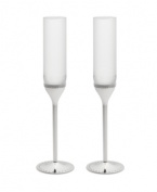 Echoing the elegant details of a wedding dress, Vera Wang's Grosgrain toasting flutes marry clean lines with lavish silver-plated stems and ribbon-inspired trim.