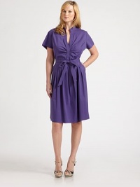 Slip into this crisp shirtdress featuring a waist-defining tie belt, convenient slash pockets and a curve-flattering, pleated skirt.Mandarin collarShort sleevesSelf-tie beltSide zipperSlash pocketsBack yokeAbout 26 from natural waist70% cotton/26% nylon/4% elastaneDry cleanImportedAdditional Information Women's Salon Z Size Guide 