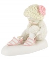 While no one is looking, this adorable baby plays dress-up. Crafted of porcelain bisque from Department 56.