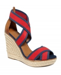 This all-American style is always on-trend. Tommy Hilfiger's Venice espadrille wedges make for cool comfort in the summer heat.