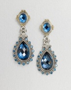 An exquisite teardrop design with beautiful faceted London blue topaz and blue topaz stones set in sterling silver and accented with 18k gold. Sterling silver18k goldBlue topazLondon blue topazDrop, about 1.75Post backImported 