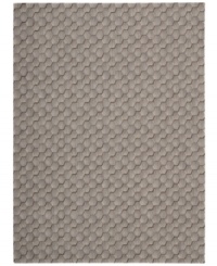 The perfect complement to your sophisticated space, this Loom Select Neutrals area rug from Calvin Klein features an intricate honeycomb motif in soothing tones. Crafted of pure New Zealand wool, this design offers supreme texture, utter softness and the utmost in durability.