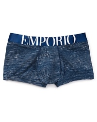 Soft, breathable cotton is blended for stretch in these savagely cool trunks from Emporio Armani, featuring an allover animal-like pattern and a body-defined fit.