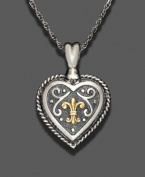 Victorian elegance reigns in this 14k gold and sterling silver heart pendant. Approximate length: 24 inches. Approximate drop: 1-1/2 inches.