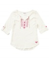 She can sport a beachy style with this cozy looks and feel of this embroidered top from Roxy.