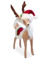 Ready to make the rounds, this cozy reindeer dons a velvety red hat and blanket to match Santa's holiday best. With the soft, flexible features and unmistakable style of Annalee dolls.