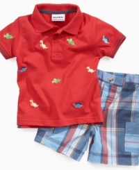 Dig up some fun! Encourage his inner archaeologist with this adorable dinosaur polo shirt and plaid shorts from Blueberi Boulevard.