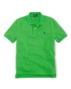 A short-sleeved polo shirt is cut in soft, breathable cotton mesh.