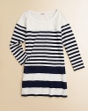 Stripes go from none at the top to thin through the body to wide at the hem in this effortless smooth knit tunic that can double as a dress.Scoop necklineLong sleevesPullover stylingModal/cottonMachine washImported