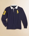 A classic rugby is updated with heritage details for an always-preppy look.Pointed polo collarLong sleevesButton-frontEven vented hemCottonMachine washImported Please note: Number of buttons may vary depending on size ordered. 