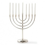 A new heritage piece for your family, this classic and elegant menorah is crafted from Christofle silver.