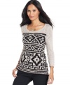 Style&co. makes the tribal trend totally wearable with this bold patterned sweater, rendered in neutral, go-with-everything colors.