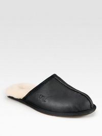 Warm, comfortable leather slip-ons are fully lined in sheepskin, which naturally wicks away moisture and helps keep feet dry.Leather upperLeather liningPadded insoleRubber soleImported