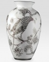 Like a beautiful Japanese screen translated to fine bone china, this graceful, urn-shaped vase presents a meticulously rendered peacock surrounded by lush flowers in soft shades of plum and platinum, embellished with hand-set amethyst-tinted Swarovski crystals.Bone chinaCrystals17H X 10W X 7.5DHand washImported