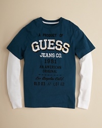 Contrast sleeve insets give this cool logo tee from GUESS a sporty look your little dude will dig.