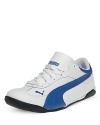 PUMA's Fast Cat sneakers are low and lean and bring the speak with a wide contrast racing stripe along the side.