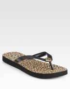 Tried-and-true style with a leopard-print footbed and signature designer emblem. Rubber upperSignature emblemImportedOUR FIT MODEL RECOMMENDS ordering one half size down as this style runs large. 