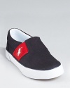 Ralph Lauren Childrenswear's Gavin slip-on updates a classic with contrast side stripes with embroidered pony logo.