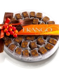 Fall into a world of decadence with these classic milk chocolate mint candies from Frango. Each gourmet chocolate piece is specially painted with a festive autumn leaf motif, making this box ripe for the giving.