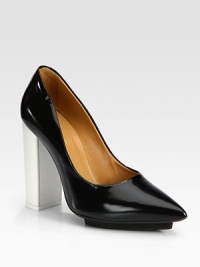 An island platform and contrasting block heel is a modern twist on classic point toe leather pumps. Self-covered heel, 4½ (115mm)Island platform, ½ (15mm)Compares to a 4 heel (100mm)Leather upperPoint toeLeather liningLeather and rubber solePadded insoleImportedOUR FIT MODEL RECOMMENDS ordering true size. 