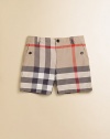 Classic checks blown way up are both handsome and sporty on pure cotton shorts.Elasticized back waist with single button and belt loopsZip flyFlat frontAngled button pocketsBack button-flap pocketsCottonMachine washImported