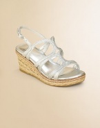 Sparkly straps on a rope-covered wedge combine the rustic and the glamorous.Glitter fabric upperBuckle strapRope-covered wedge heel with rubber soleFaux leather liningImported