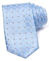 A micro diamond pattern accents a grid jacquard on this silk tie from The Men's Store at Bloomingdale's.