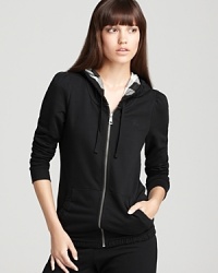 Rendered in velvety-soft cotton, this lightweight Burberry Brit hoodie infuses your laidback style with luxe appeal. A check-lined hood lends a chic finish to the sumptuous silhouette.