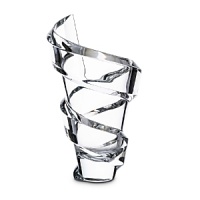 Designed by Thomas Bastide for Baccarat, this exquisite crystal vase makes a bold statement with its dramatic spiral design. It looks equally beautiful alone or filled with flowers.