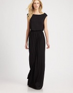 Complemented by an elastic waistband, this slightly shirred maxi dress has a boatneck, cap sleeves and sultry side slit. BoatneckCap sleevesElastic waistbandSide slitAbout 40 from natural waist92% modal/8% spandexDry cleanMade in USAModel shown is 5'10 (177cm) wearing US size Small.