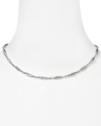 Slip on something simple and sparkly with this hammered silver link necklace from Nadri. It's delicate design hints at understated chic.