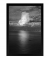 Thick clouds roll in over the horizon, creating a dark and stormy yet awe-inspiring scene in black and white. A sleek black frame makes it ready to hang and a bold new focus point in any room.