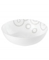 Tiny squares with a hint of shine run circles around this glossy white soup bowl from Mikasa dinnerware. These dishes are from a fresh, spirited collection that's made for modern tables. Sparkle Circles features minimalist shapes in sturdy bone china for anytime use.